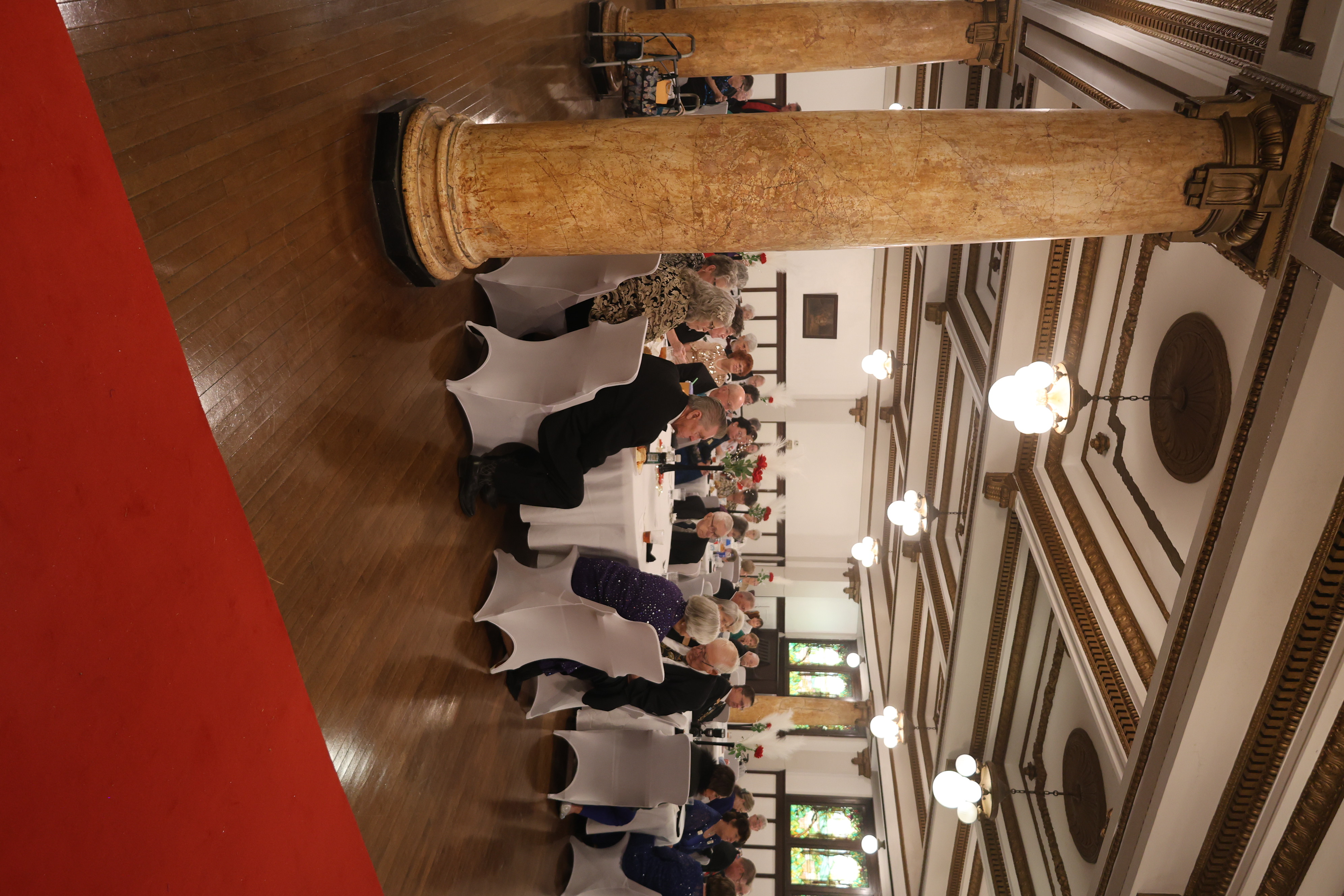 Tiffany Ballroom interior with red carpet and historic columns