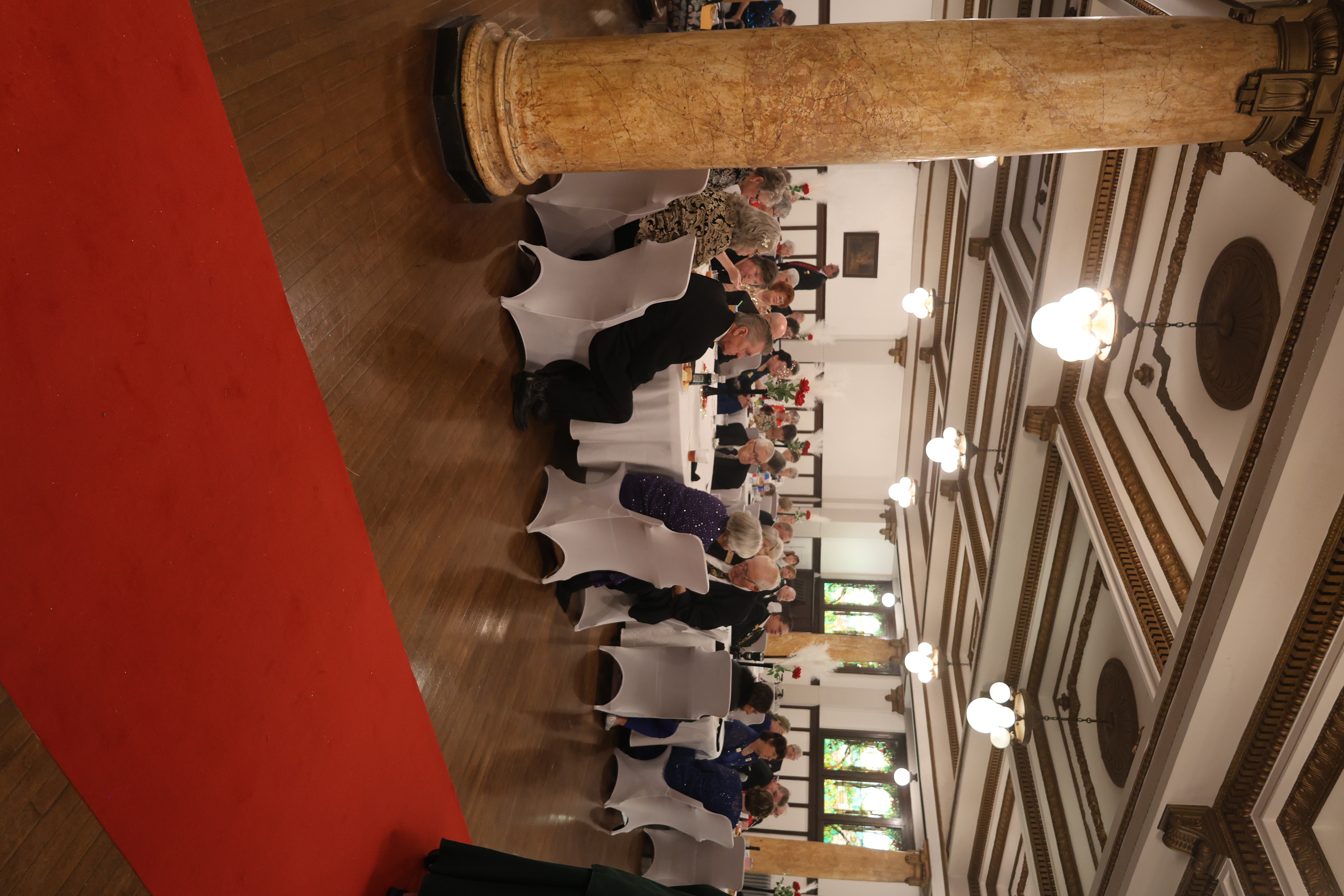 Tiffany Ballroom interior with historic columns and red carpet